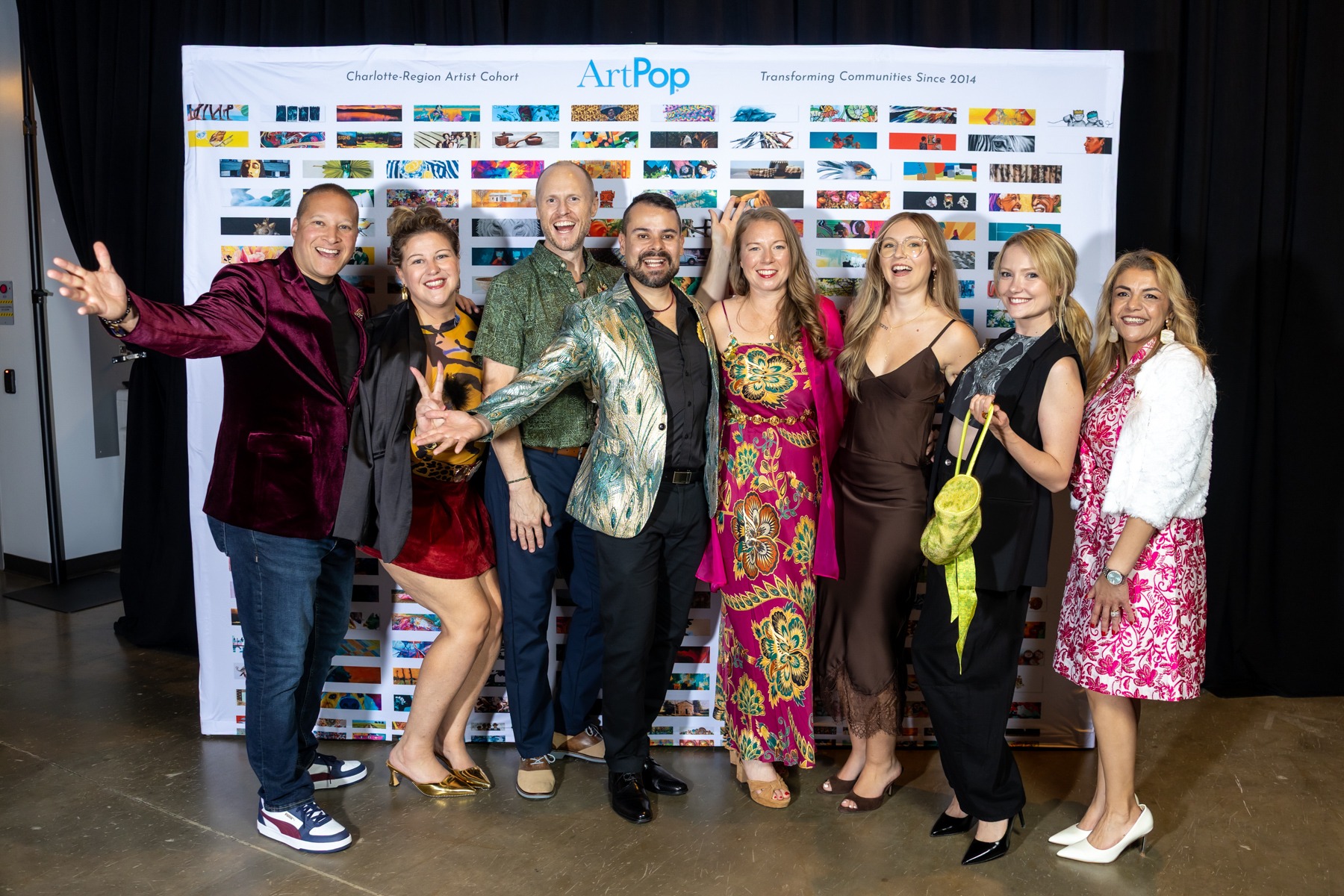 Pinnacle Dinner community members with artist Diego Alba at the ArtPop upcycled fashion show